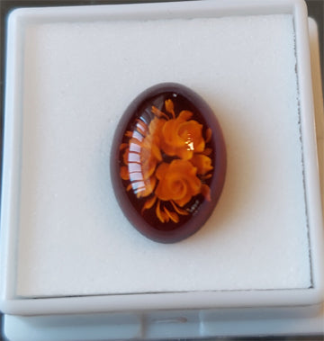 Amber Flower   - -  Size  -  14x10 mm - oval        Weight Carat  -  4.55